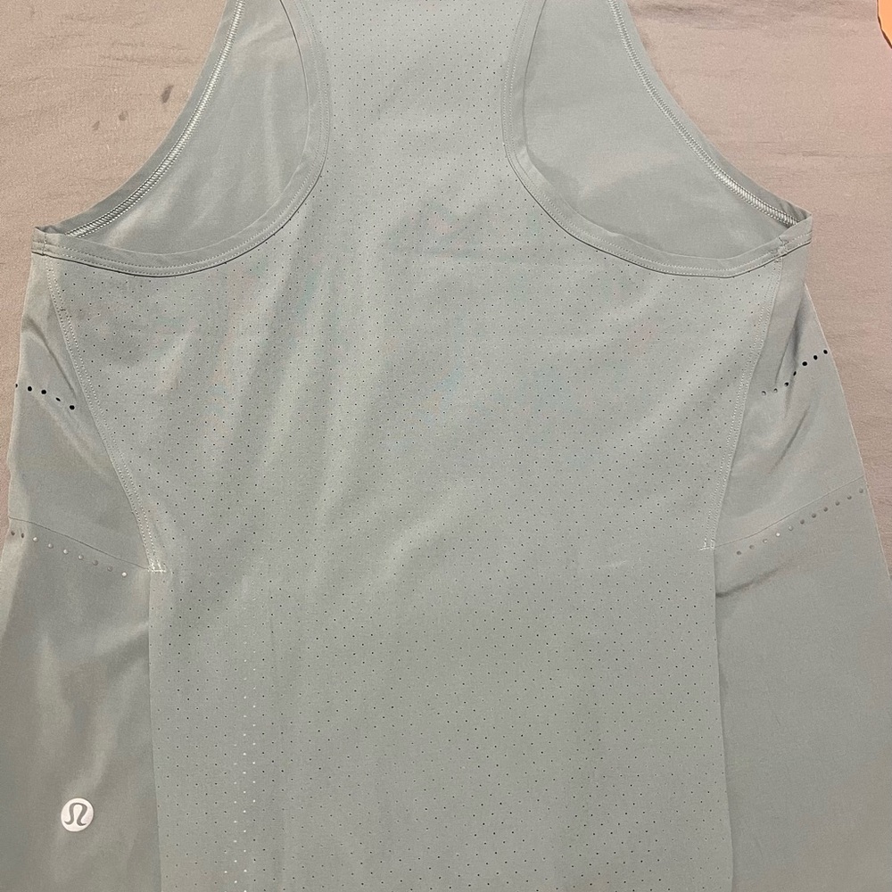 Lululemon sage vented tank.  Never worn.  Like new. Size 4